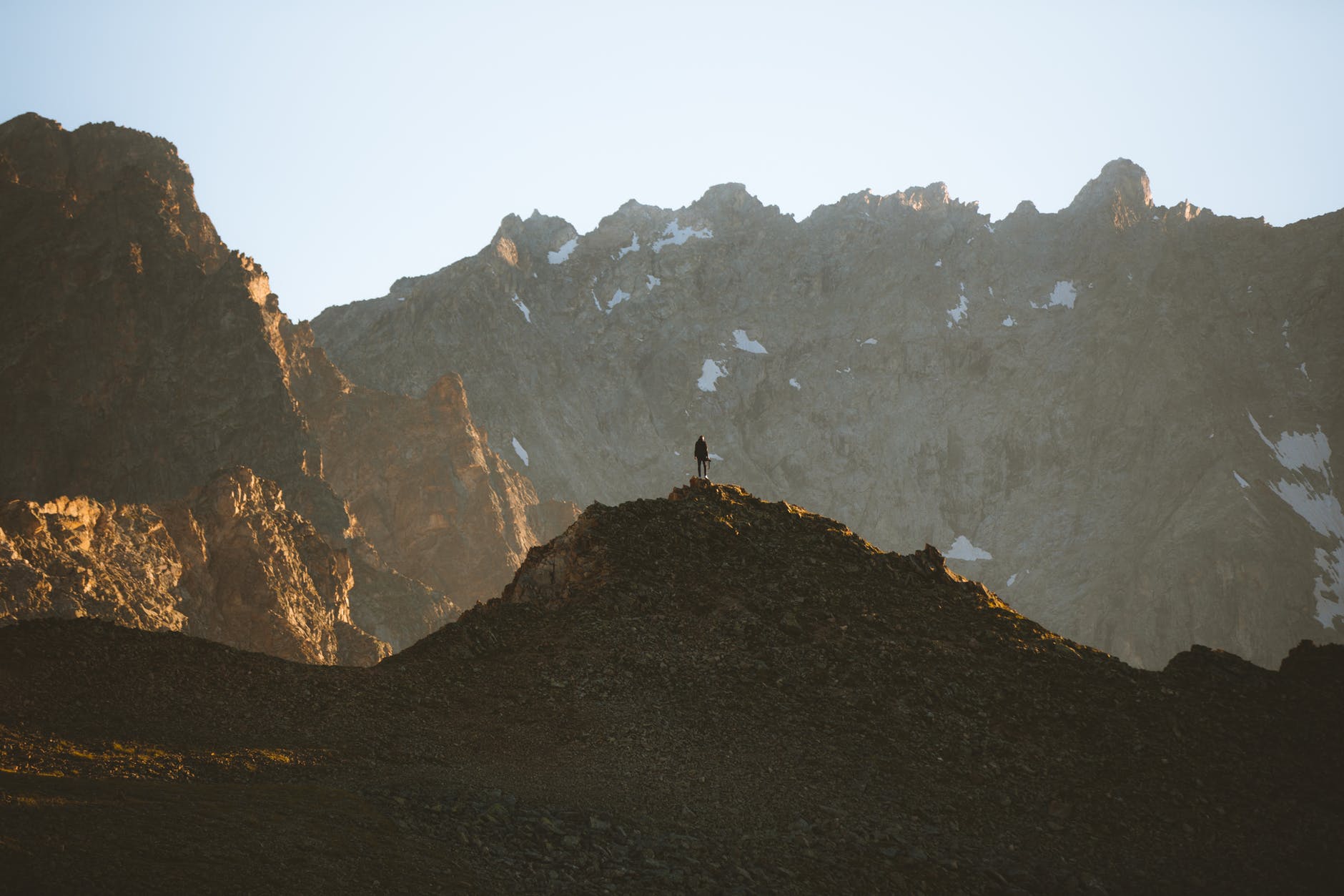 person standing near mountains